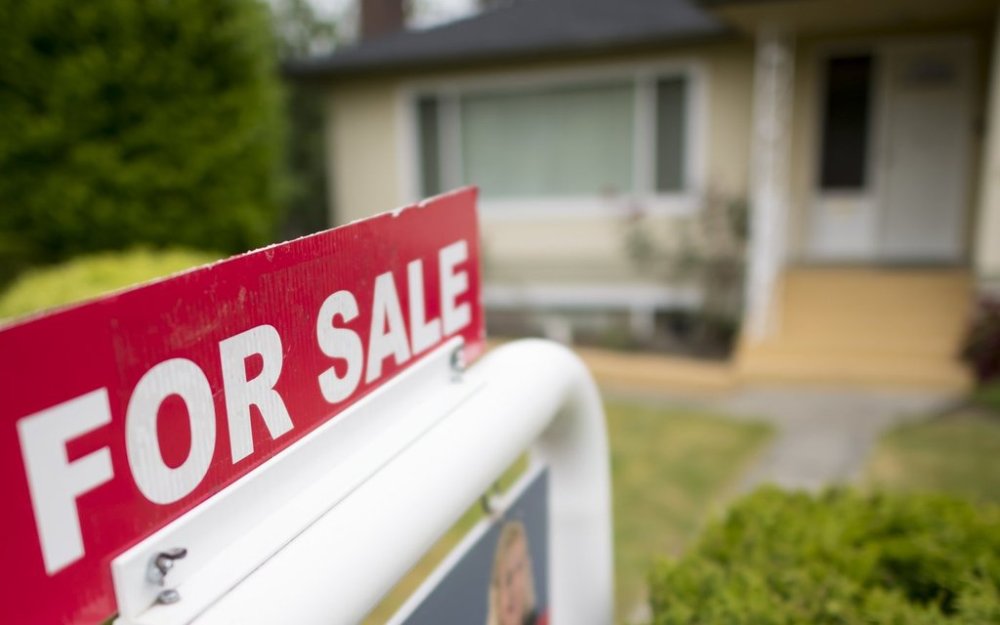 A real estate sign is pictured in Vancouver, B.C., Tuesday, June, 12, 2018. THE CANADIAN PRESS Jonathan Hayward