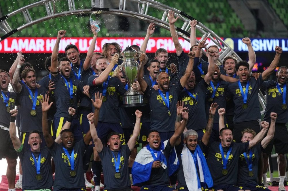 Nashville SC players celebrate their win over Austin FC in an U.S. Open Cup final soccer match in Austin, Texas, Wednesday, Oct. 1, 2025. (AP Photo/Eric Gay)