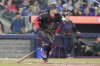 Toronto Blue Jays' Myles Straw (3) hits an RBI double against the Baltimore Orioles during sixth inning MLB baseball action in Toronto on Friday Sept. 12, 2025. THE CANADIAN PRESS/Chris Young