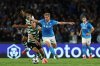 Napoli's Kevin De Bruyne, center, dribbles against Sporting during a Champions League soccer match, Wednesday, Oct. 1, 202, at Diego Armando Maradona stadium in Naples, Italy. (Alessandro Garofalo//LaPresse via AP)