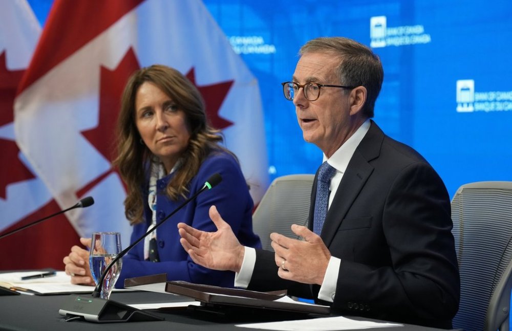 Bank of Canada Governor Senior Deputy Governor Carolyn Rogers looks on as Tiff Macklem responds to a question during a news conference in Ottawa, Wednesday, Sept. 17, 2025. THE CANADIAN PRESS/Adrian Wyld