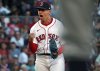 Boston Red Sox starting pitcher Jose De Leon reacts after recording the final out of the top of the sixth inning during a baseball game against the Detroit Tigers, Sunday, Sept. 28, 2025, in Boston. (AP Photo/Jim Davis)
