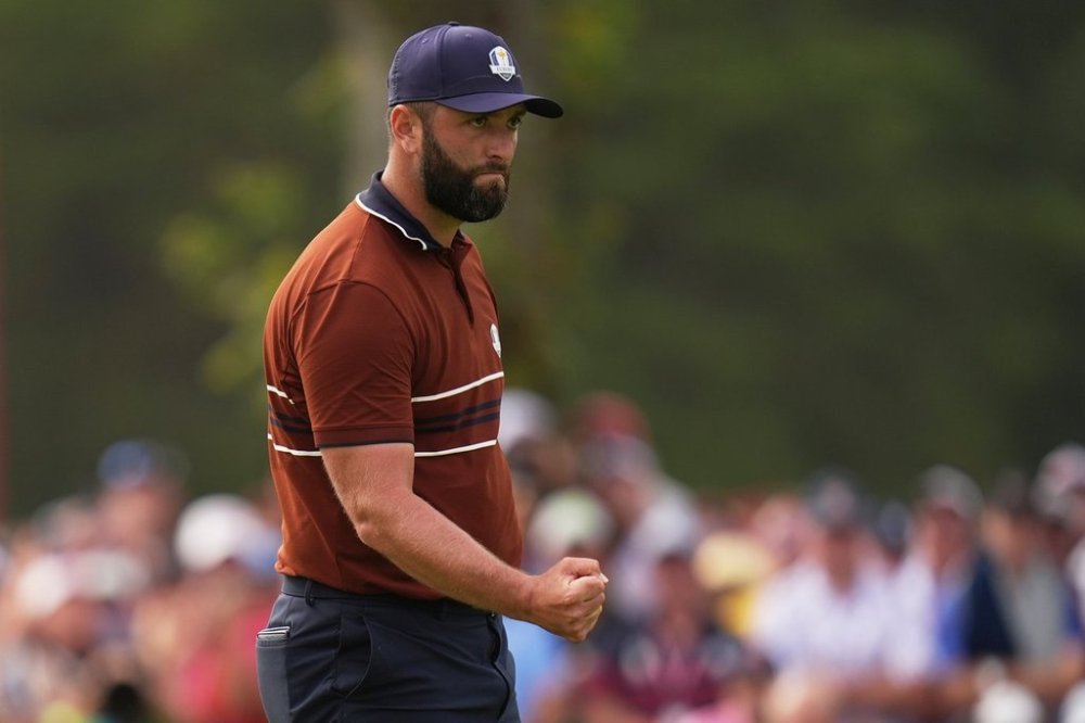 Europe's Jon Rahm celebrates after a putt on the ninth hole at Bethpage Black golf course during the Ryder Cup golf tournament, Saturday, Sept. 27, 2025, in Farmingdale, N.Y. (AP Photo/Seth Wenig)
