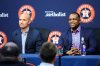 Houston Astros Manager Joe Espada, left, and General Manager Dana Brown speak to reporters during an MLB postseason press conference in Houston, Tuesday, Sept. 30, 2025. (AP Photo/Ashley Landis)
