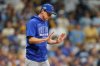 Chicago Cubs manager Craig Counsell comes to the mound to make a pitching change during the third inning of Game 2 of baseball's National League Division Series against the Milwaukee Brewers Monday, Oct. 6, 2025, in Milwaukee. (AP Photo/Kayla Wolf)
