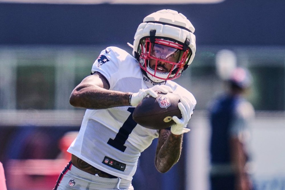 FILE - New England Patriots wide receiver Ja'Lynn Polk (1) makes a catch at the team's NFL football training camp, Wednesday, July 30, 2025, in Foxborough, Mass. (AP Photo/Charles Krupa, File)