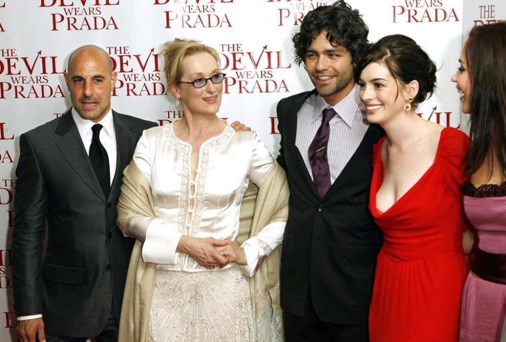 FILE - Cast members from left to right, Stanley Tucci, Meryl Streep, Adrian Grenier, Anne Hathaway, and Emily Blunt, pose for photographers during the red carpet arrivals for the New York premiere of the film titled