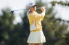 Charley Hull, of England, tees off on the second hole during the first round of the Kroger Queen City Championship golf tournament, Thursday, Sept. 11, 2025, at TPC River's Bend in Cincinnati. (AP Photo/Tanner Pearson)