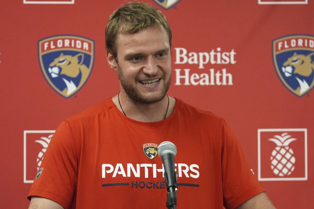 Florida Panthers forward Aleksander Barkov speaks during the NHL hockey team's media day, Wednesday, Sept. 17, 2025, in Fort Lauderdale, Fla. (AP Photo/Marta Lavandier)