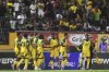 Jamaica's players celebrate their second goal against Trinidad and Tobago during a World Cup 2026 qualifying soccer match at the Independence Park stadium in Kingston, Jamaica, Tuesday, Sept. 9, 2025. (AP Photo/Collin Reid)