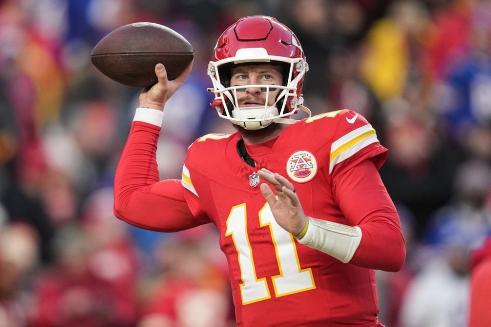 FILE - Kansas City Chiefs quarterback Carson Wentz (11) warms up before the AFC Championship NFL football game against the Buffalo Bills, Jan. 26, 2025, in Kansas City, Mo. (AP Photo/Ashley Landis, file)