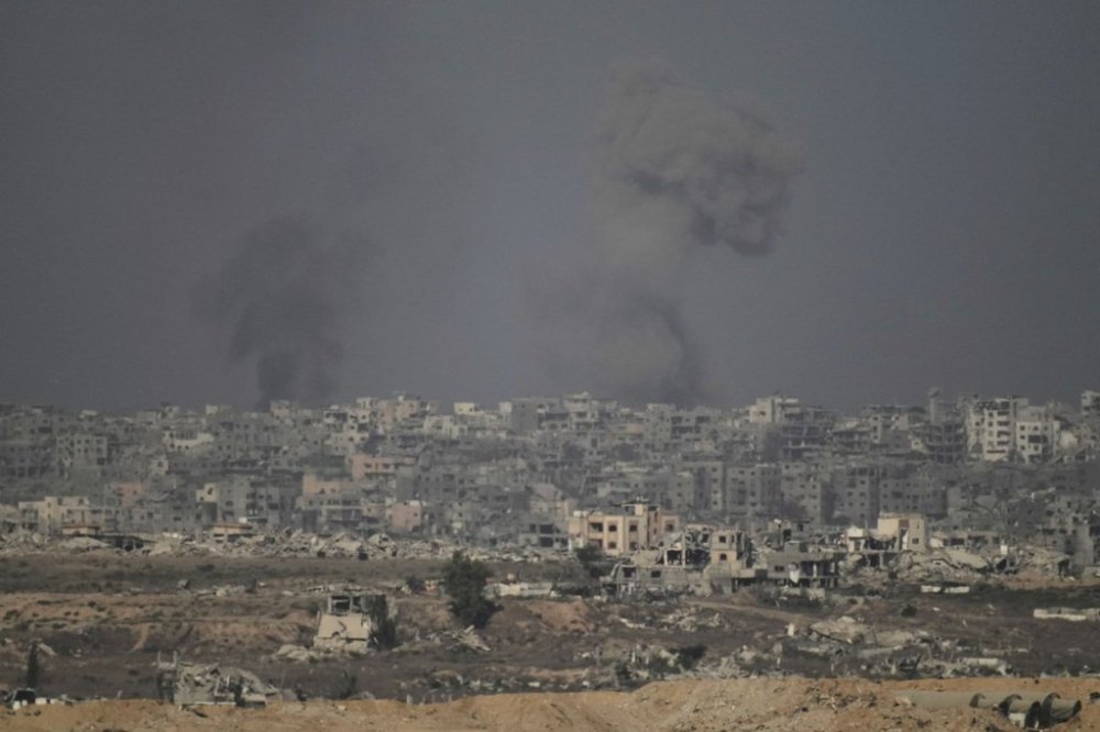 Smoke rises following an Israeli military strike in the Gaza Strip, as seen from southern Israel, Tuesday, Sept. 16, 2025. (AP Photo/Leo Correa)