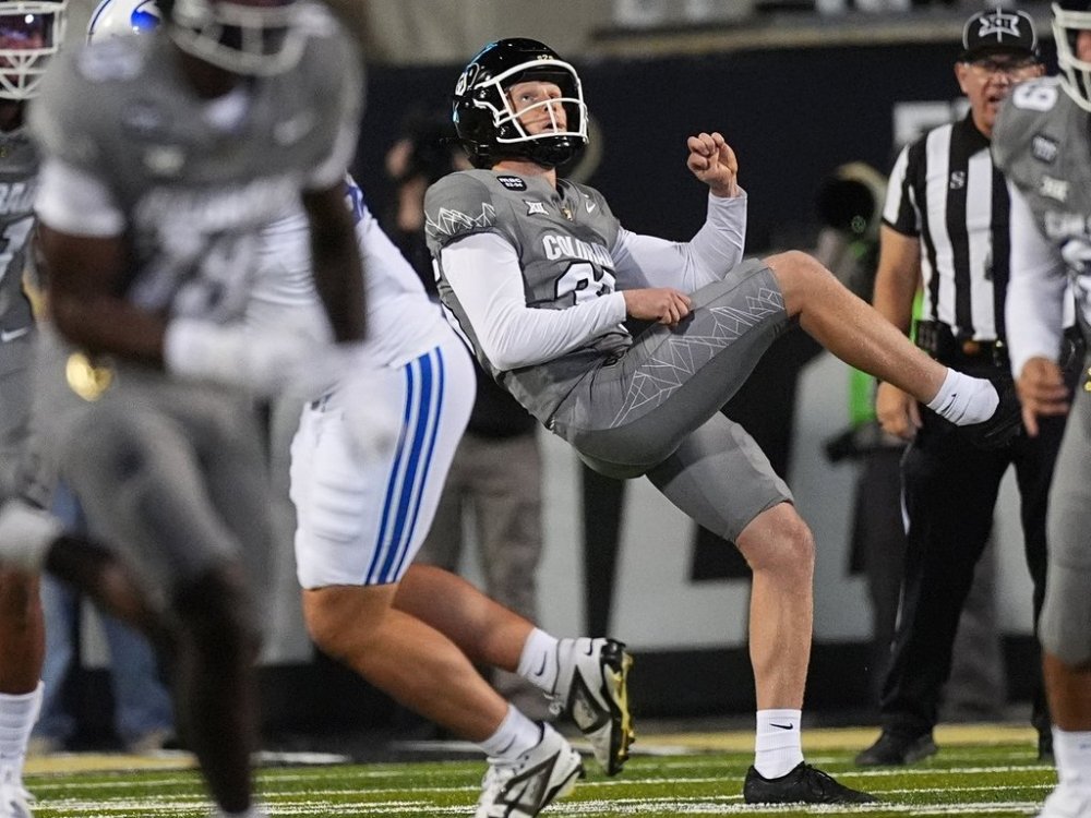 Colorado punter Damon Greaves follows the flight of his kick in the second half of an NCAA college football game against BYU, Saturday, Sept. 27, 2025, in Boulder, Colo. (AP Photo/David Zalubowski)