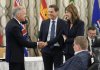 Canadian Prime Minister Mark Carney, left, greets Alberta Premier Danielle Smith, right, during the 2025 summer meetings of Canada's Premiers at Deerhurst Resort in Huntsville, Ont., on Tuesday, July 22, 2025. THE CANADIAN PRESS/Nathan Denette