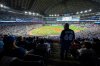 FILE - Fans watch the Toronto Blue Jays home opener against the Baltimore Orioles, in Toronto on Thursday, March 27, 2025. (Arlyn McAdorey/The Canadian Press via AP, file)