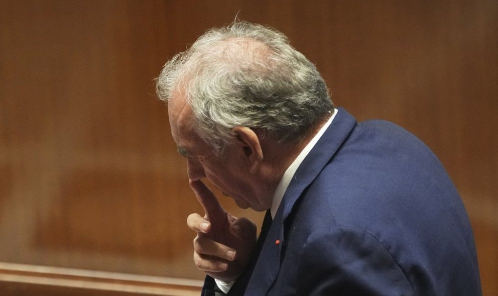 French Prime Minister Francois Bayrou reacts after his speech at the National Assembly, prior to a parliamentary confidence vote that could bring him down, in Paris, France, Monday, Sept. 8, 2025. (AP Photo/Christophe Ena)