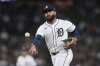 Detroit Tigers second baseman Gleyber Torres tosses the ball to first base for an out on a Chicago White Sox's Brooks Baldwin ground ball during the eighth inning of a baseball game Saturday, Sept. 6, 2025, in Detroit. (AP Photo/Paul Sancya)