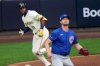 Chicago Cubs pitcher Matthew Boyd watches as Milwaukee Brewers' Jackson Chourio hits a two-run scoring single during the first inning of Game 1 of baseball's National League Division Series Saturday, Oct. 4, 2025, in Milwaukee. (AP Photo/Morry Gash)