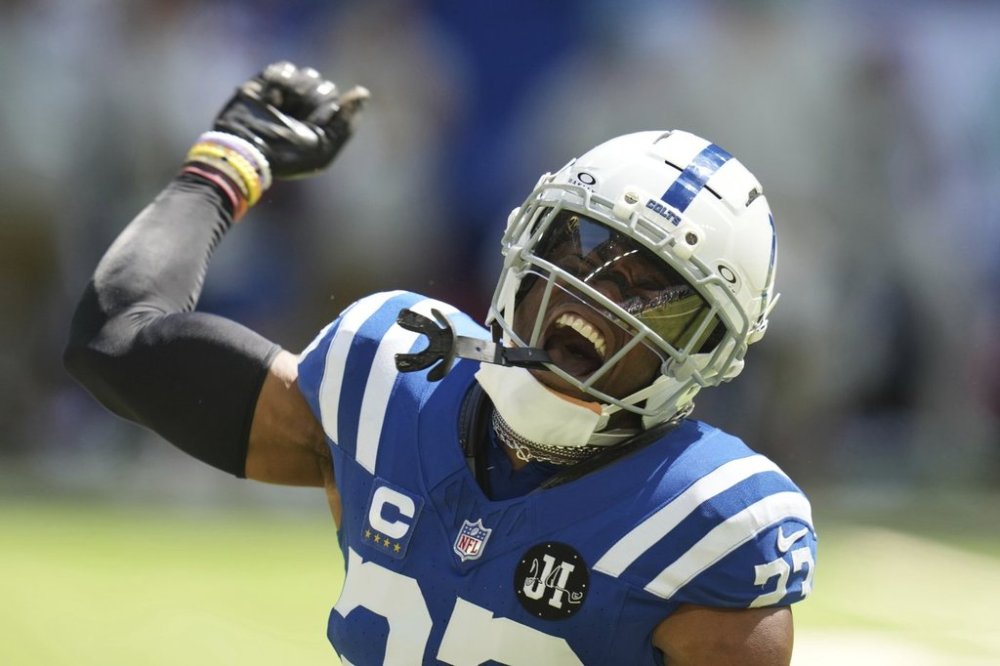 Indianapolis Colts cornerback Kenny Moore II celebrates forcing a turnover during the first half of an NFL football game against the Miami Dolphins on Sunday, Sept. 7, 2025, in Indianapolis. (AP Photo/Darron Cummings)