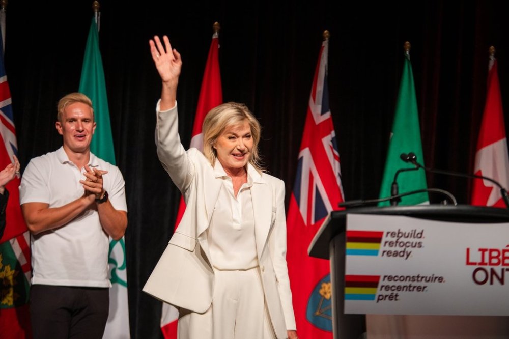 Ontario Liberal Bonnie Crombie waves onstage after winning 57 per cent of the votes in a leadership review vote at the Ontario Liberal Party annual general meeting on Sunday, September 14, 2025. THE CANADIAN PRESS/Laura Proctor