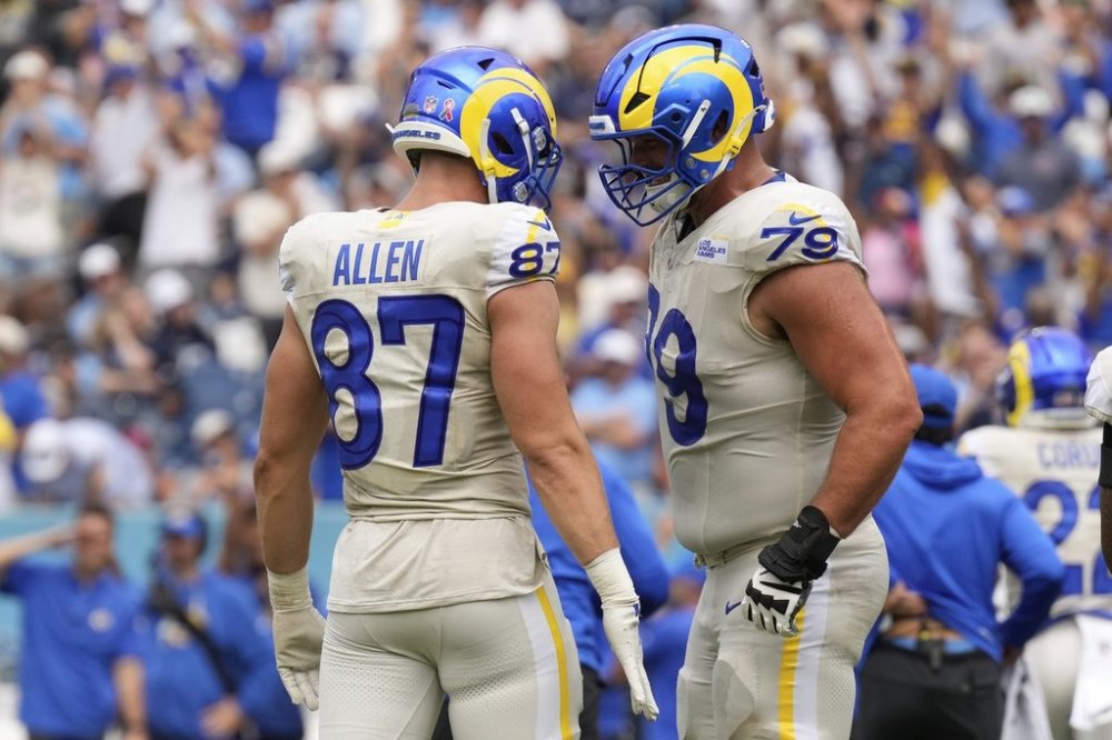Los Angeles Rams tight end Davis Allen, left, celebrates his touchdown with offensive tackle Rob Havenstein during the second half of an NFL football game against the Tennessee Titans, Sunday, Sept. 14, 2025, in Nashville, Tenn. (AP Photo/George Walker IV)
