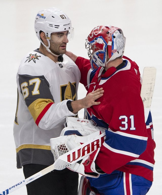 Vegas Golden Knights left wing Max Pacioretty (67) congratulates Montreal Canadiens goaltender Carey Price (31) following NHL Stanley Cup playoff hockey semifinal action Thursday, June 24, 2021 in Montreal. THE CANADIAN PRESS/Ryan Remiorz