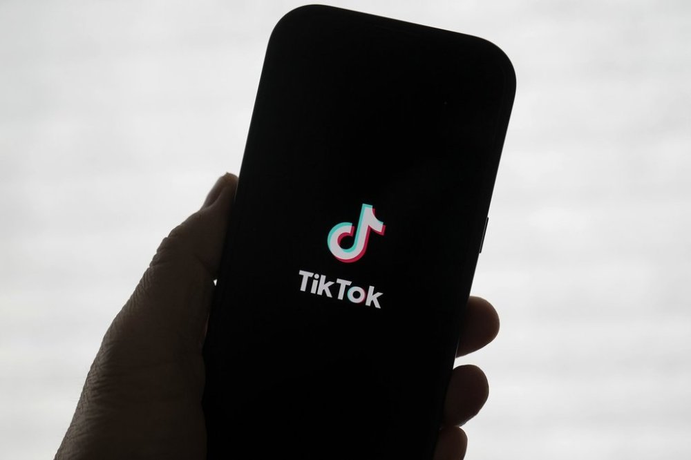 A TikTok logo is shown on a phone in San Francisco on Friday, Jan. 17, 2025. (AP Photo/Jeff Chiu, File)
