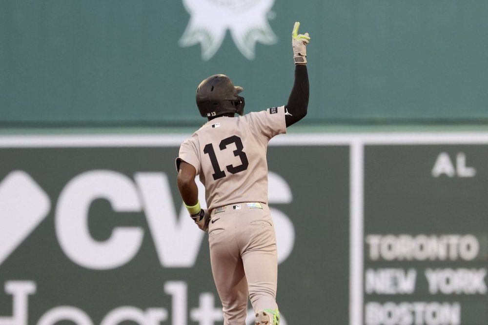 New York Yankees' Jazz Chisholm, Jr. gestures as he runs the bases after hitting a home run during the fifth inning of a baseball game against the Boston Red Sox, Saturday, Sept. 13, 2025, in Boston. (AP Photo/Mark Stockwell)