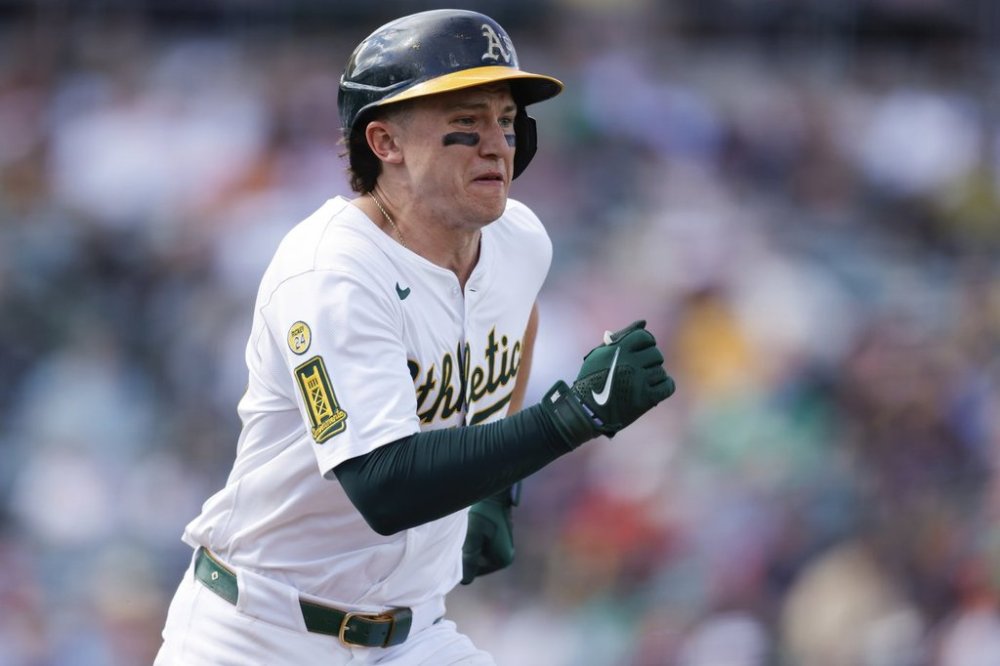 Athletics' Zack Gelof beats the throw for a singe during the eighth inning of a baseball game against the Boston Red Sox Wednesday, Sept. 10, 2025, in West Sacramento, Calif. (AP Photo/Sergio Estrada)