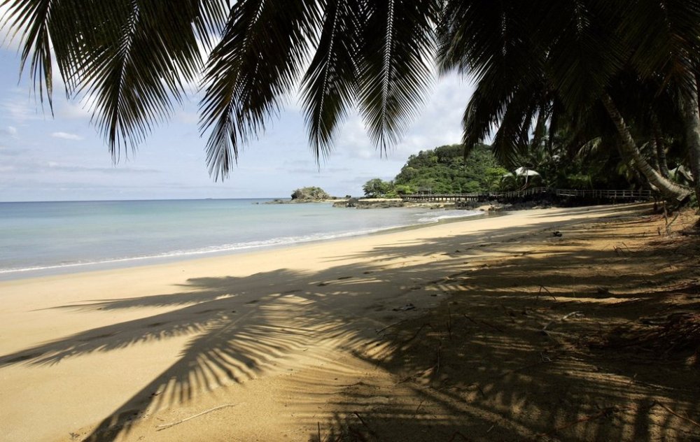 FILE - The empty beach of the Bombom resort on Principe Island, Nov. 8 2006. (AP Photo/Armando Franca, File)