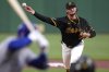 Pittsburgh Pirates pitcher Paul Skenes delivers during the second inning of a baseball game against the Chicago Cubs in Pittsburgh, Tuesday, Sept. 16, 2025. (AP Photo/Gene J. Puskar)