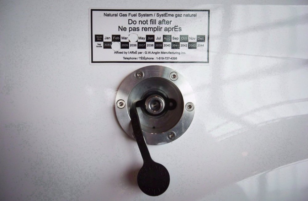 A natural gas refuelling port is seen on a vehicle at the Vancouver Board of Trade energy forum, in Vancouver in an October 8, 2014, file photo. THE CANADIAN PRESS/Darryl Dyck
