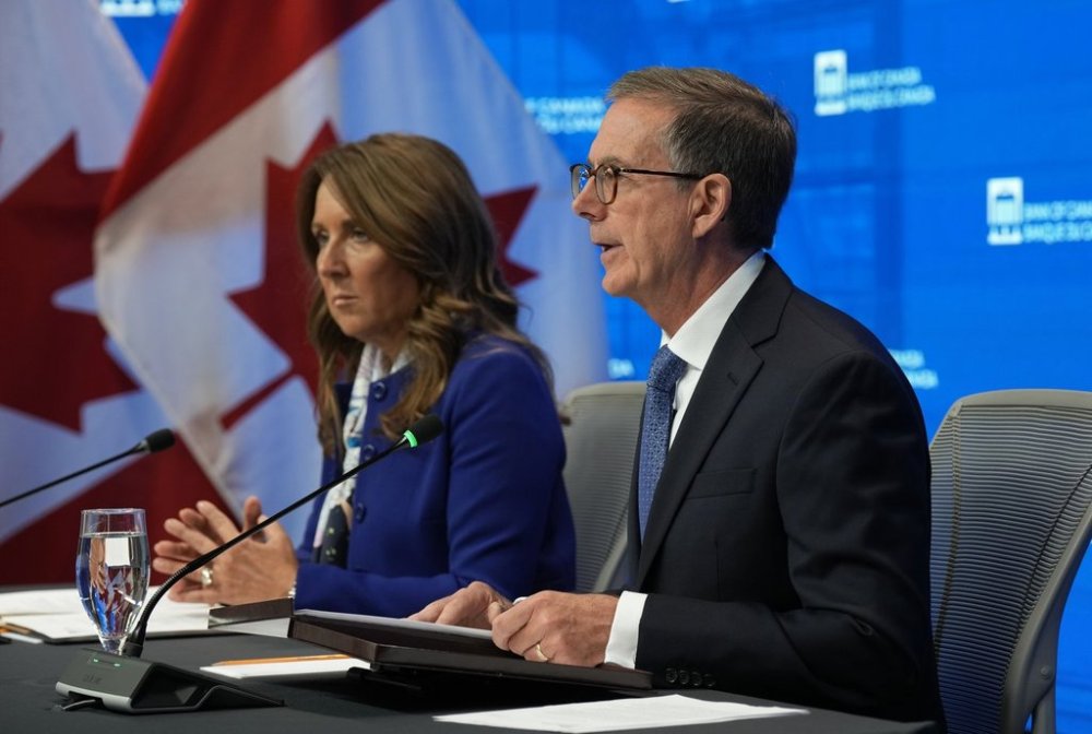 Bank of Canada senior deputy governor Carolyn Rogers, left, looks on as governor Tiff Macklem speaks during a news conference in Ottawa, Wednesday, Sept. 17, 2025. THE CANADIAN PRESS/Adrian Wyld