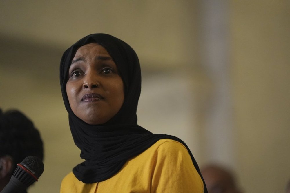 Rep. Ilhan Omar, D-Minn., speaks during a news conference in Minneapolis City Hall, Thursday, Aug. 28, 2025, in Minneapolis. (AP Photo/Abbie Parr)