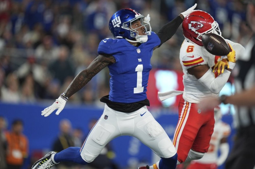 Kansas City Chiefs safety Bryan Cook (6) breaks up a pass intended for New York Giants wide receiver Malik Nabers (1)during the second half of an NFL football game Sunday, Sept. 21, 2025, in East Rutherford, N.J. (AP Photo/Seth Wenig)