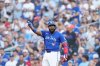 Blue Jays slugger Vladimir Guerrero Jr. (27) reacts after hitting a single in the second inning of Game 1 in MLB American League Division Series baseball action against the New York Yankees in Toronto on Oct. 4, 2025. THE CANADIAN PRESS/Nathan Denette