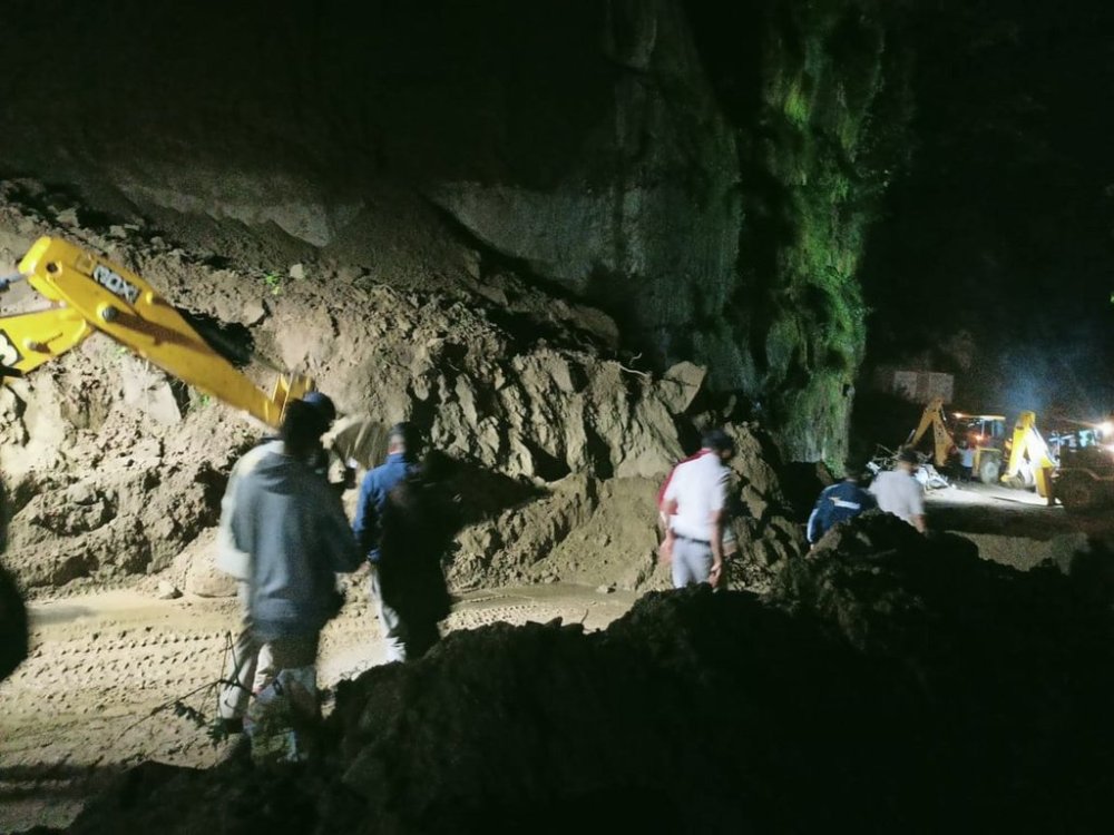 In this photo released by District Public Relation Office Bilaspur, rescued passengers of a bus are taken to a hospital after debris from a massive landslide hit their bus near Bilaspur in India's northern state of Himachal Pradesh, Tuesday, Oct. 7, 2025. (District Public Relation Office Bilaspur via AP)