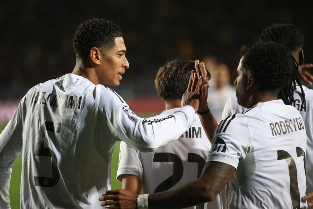 Real Madrid's Jude Bellingham, left, and Real Madrid's Rodrygo celebrate after scoring their side's goal during the Champions League opening phase soccer match between Kairat Almaty and Real Madrid at Ortalyk stadium in Almaty, Kazakhstan, Tuesday, Sept. 30, 2025. (AP Photo/Alikhan Sariyev)
