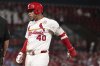 St. Louis Cardinals' Willson Contreras (40) celebrates after hitting an RBI single during the sixth inning of a baseball game against the Cincinnati Reds Monday, Sept. 15, 2025, in St. Louis. (AP Photo/Jeff Roberson)