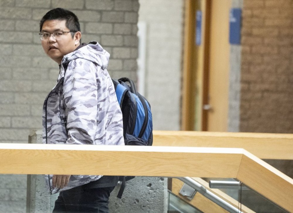 Yuesheng Wang arrives for his espionage trial at the Longueuil courthouse in Longueuil, Que., on Monday, Oct. 6, 2025. THE CANADIAN PRESS/Christinne Muschi