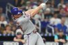 New York Mets' Pete Alonso hits a solo home run during the third inning of a baseball game against the Miami Marlins, Saturday, Sept. 27, 2025, in Miami. (AP Photo/Lynne Sladky)