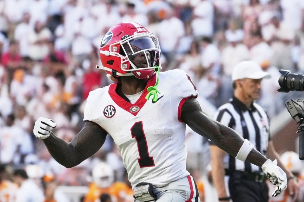 Georgia wide receiver Zachariah Branch (1) celebrates a two-point conversion during the second half of an NCAA college football game against Tennessee, Saturday, Sept. 13, 2025, in Knoxville, Tenn. (AP Photo/George Walker IV)