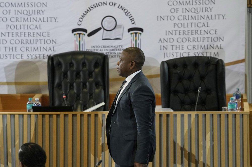 A provincial police commissioner Nhlanhla Mkhwanazi arrives for a police corruption inquiry in Pretoria, South Africa, Wednesday, Sept. 17, 2025. (AP Photo/Themba Hadebe)