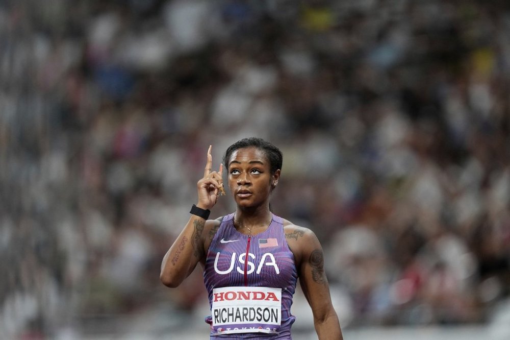 United States' Sha'Carri Richardson gestures after finishing a women's 100 meters heat at the World Athletics Championships in Tokyo, Saturday, Sept. 13, 2025. (AP Photo/Petr David Josek)