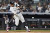 New York Yankees' Aaron Judge hits a home run during the first inning of a baseball game against the Detroit Tigers Thursday, Sept. 11, 2025, in New York. (AP Photo/Frank Franklin II)