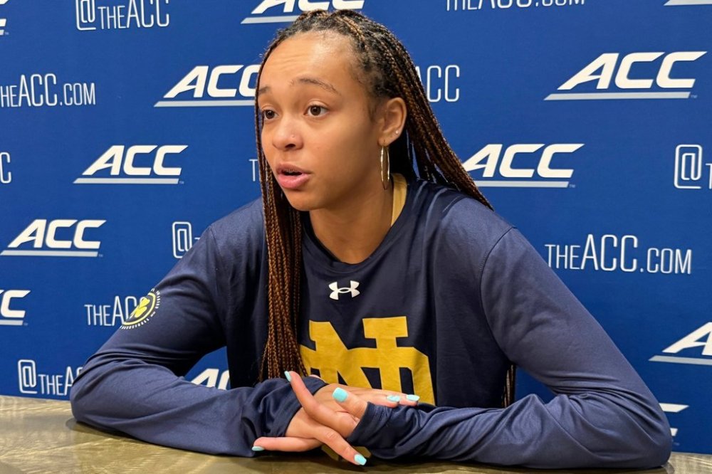 Notre Dame's two-time All-American guard Hannah Hidalgo speaks at the ACC college basketball media days, Tuesday, Oct. 7, 2025, in Charlotte, N.C. (AP Photo/Steve Reed)