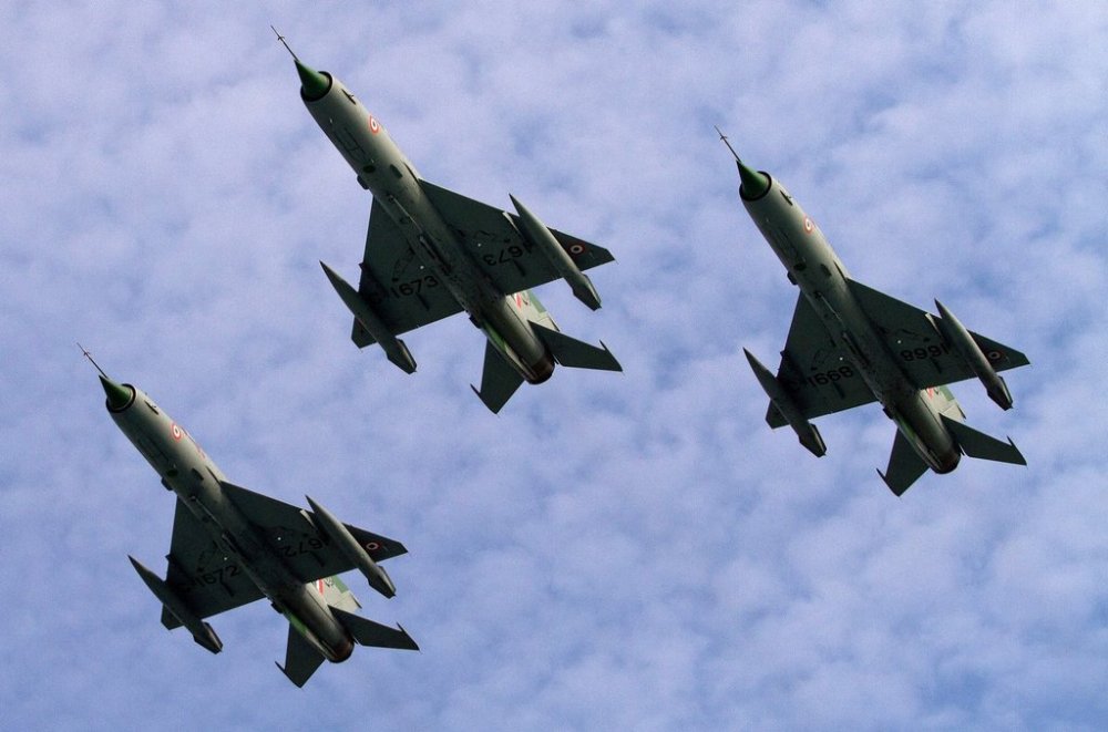 FILE -Indian Air Force (IAF) MIG 21 jet fighter aircrafts perform during a parade at an airbase in Tezpur, India, Nov. 21 2014. (AP Photo/Anupam Nath, File)
