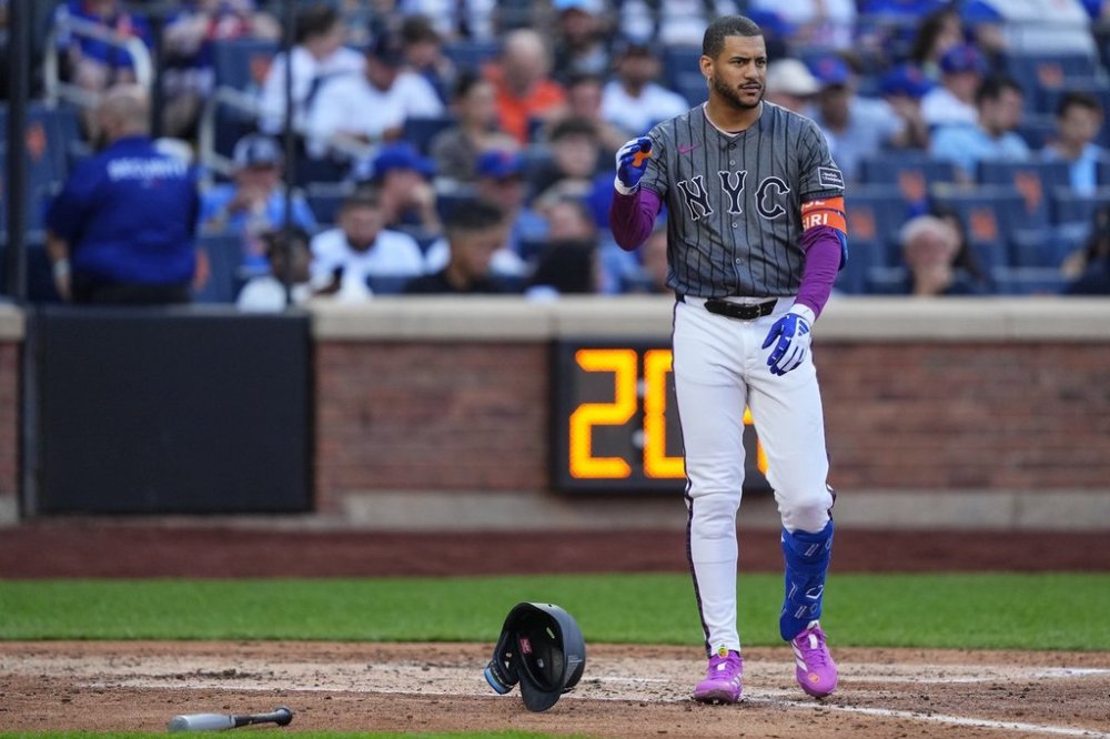 New York Mets' Jose Siri reacts after striking out during the fourth inning of a baseball game against the Texas Rangers, Saturday, Sept. 13, 2025, in New York. (AP Photo/Yuki Iwamura)