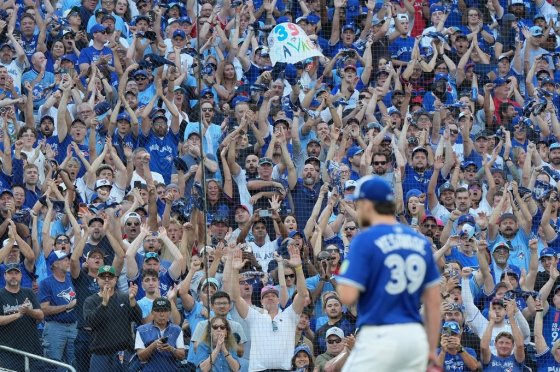 Fans cheer with a standing ovation for Toronto Blue Jays pitcher Trey Yesavage (39) after he was pulled from the mound on Sunday. (Frank Gunn / The Canadian Press files)