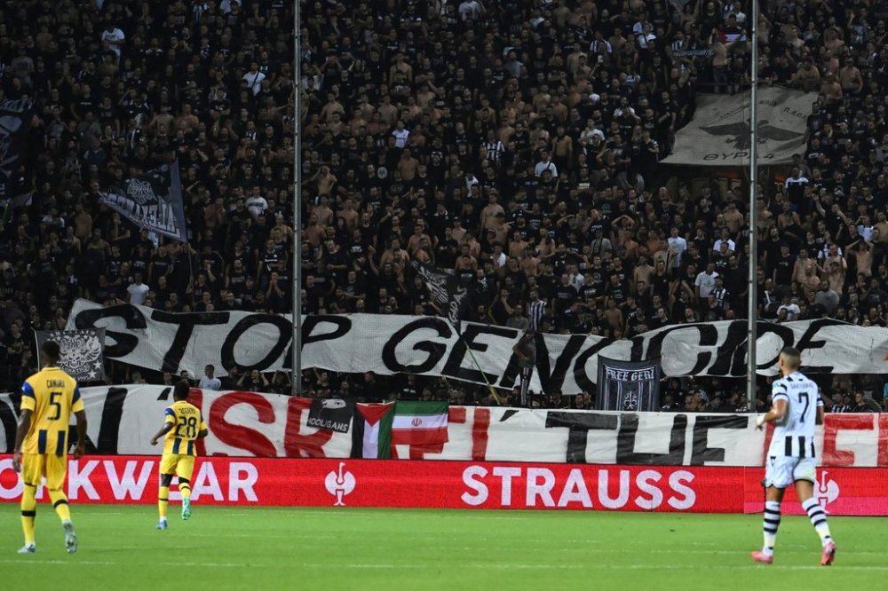 PAOK's fans display a banner that reads